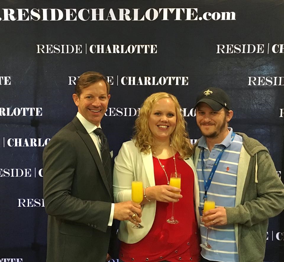Matthew Paul Brown | Reside Charlotte pictured with Justin and Jennifer at the closing of their first home in Southpark!
